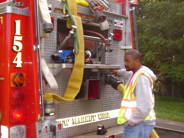 Capt. Hackey fills ET154 at Carroll County Water Supply Drill 
